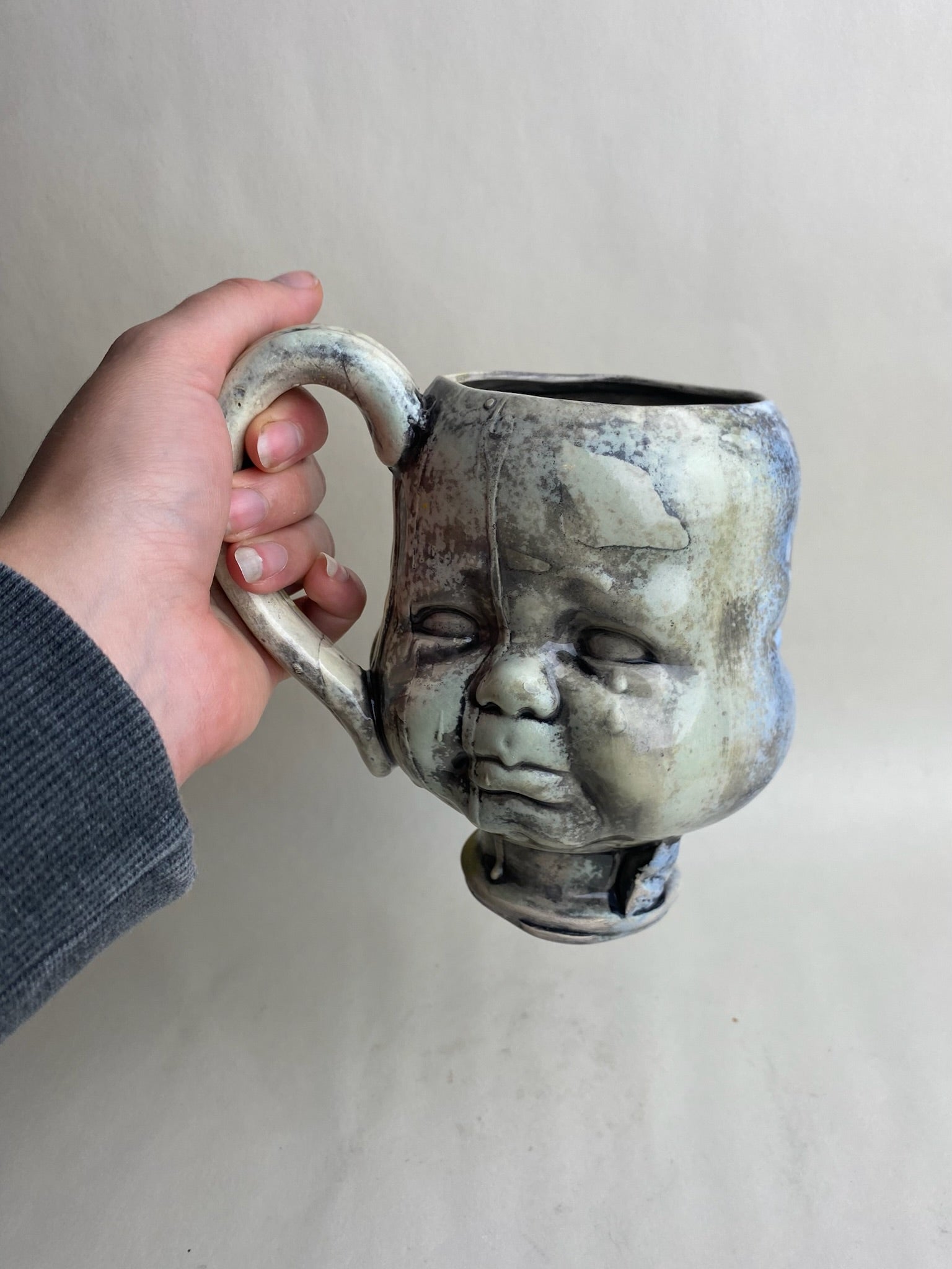 Three Face Baby Doll Head Mug