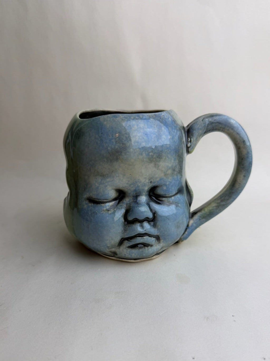 Three Face Baby Doll Head Mug
