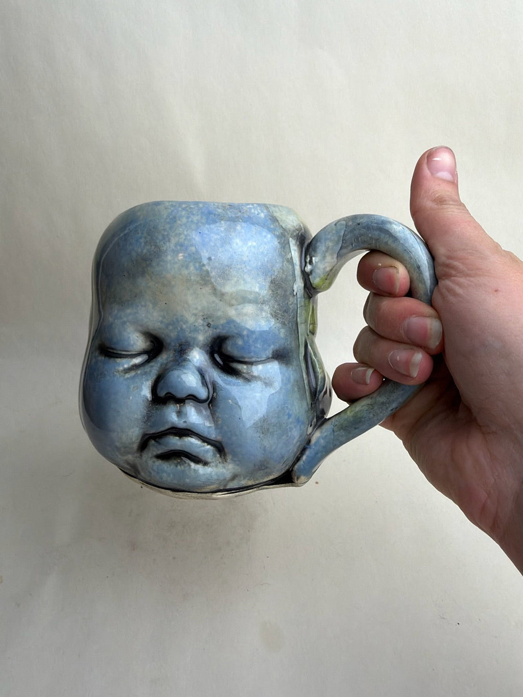 Three Face Baby Doll Head Mug