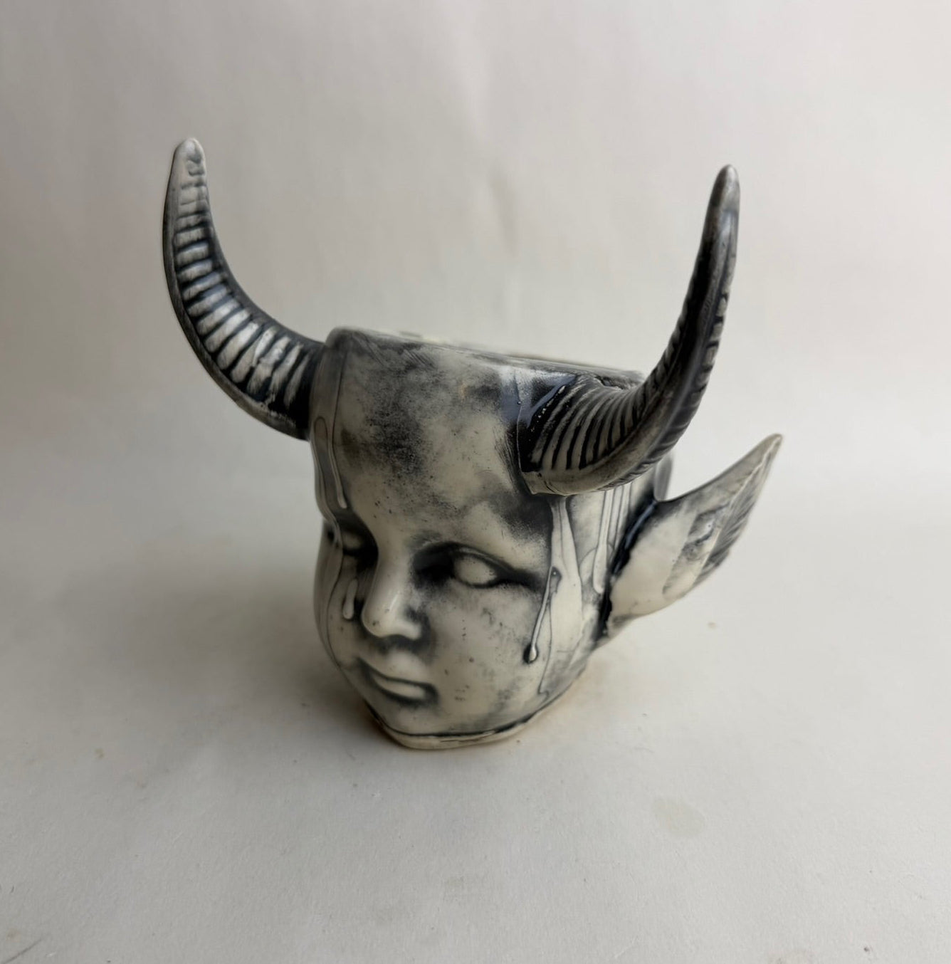 Horned Baby Doll Head With Pointed Ears