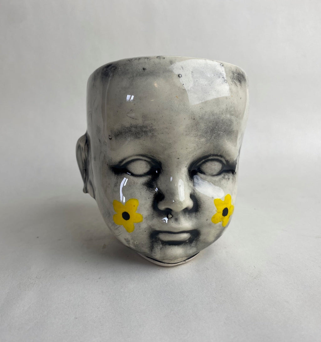 Doll Head Planter With Flower Design