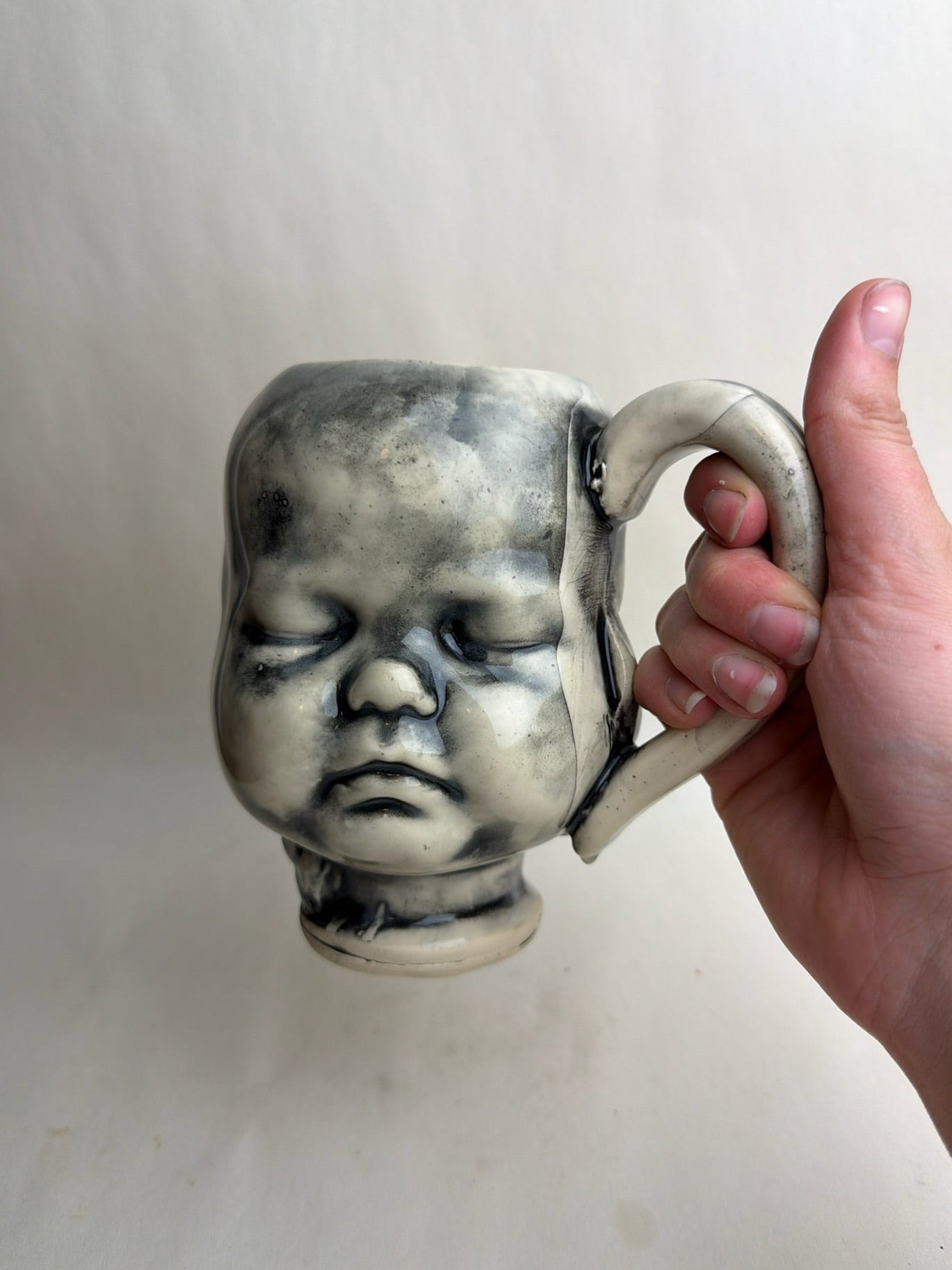 Three Face Baby Doll Head Mug