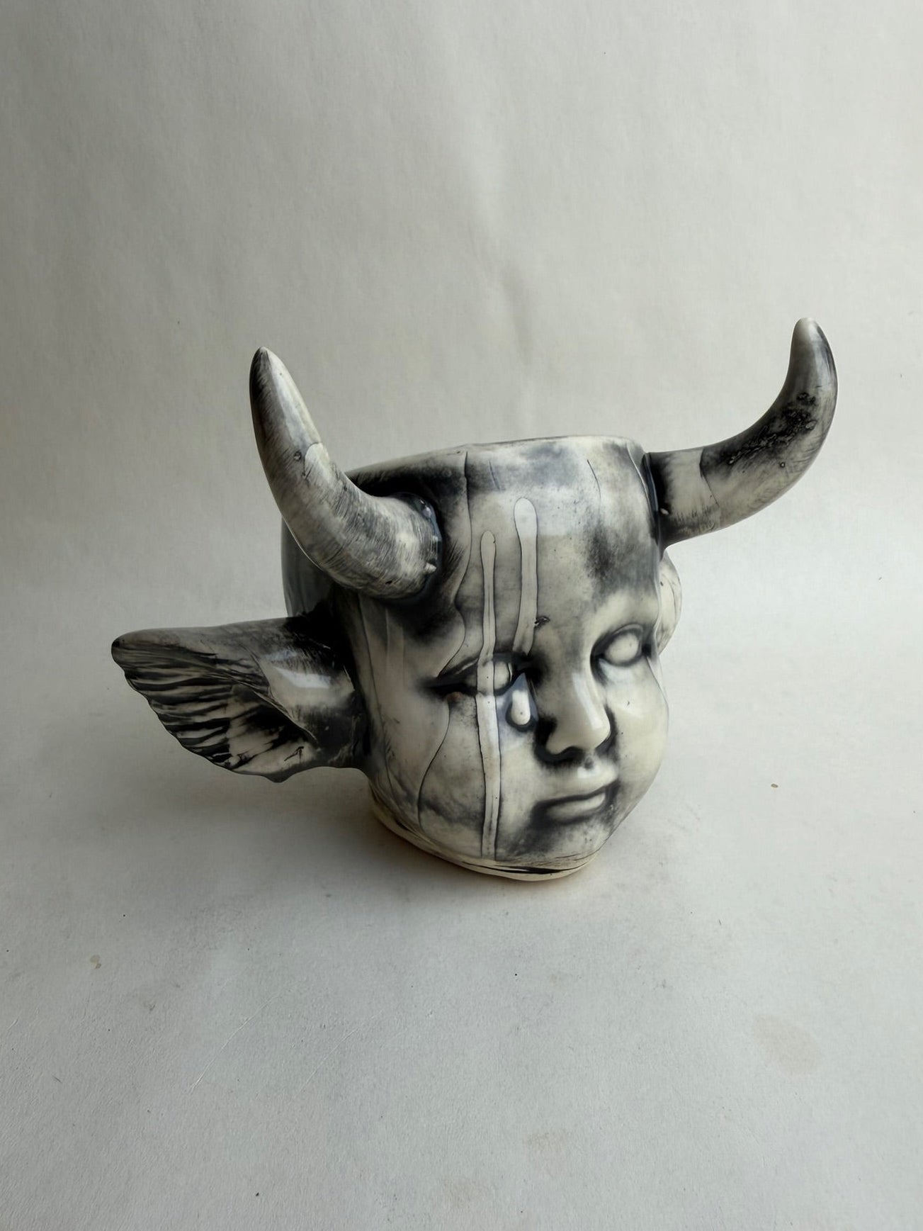 Horned Baby Doll Head With Ears