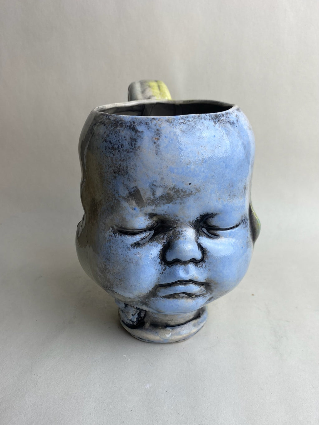 Three Face Baby Doll Head Mug