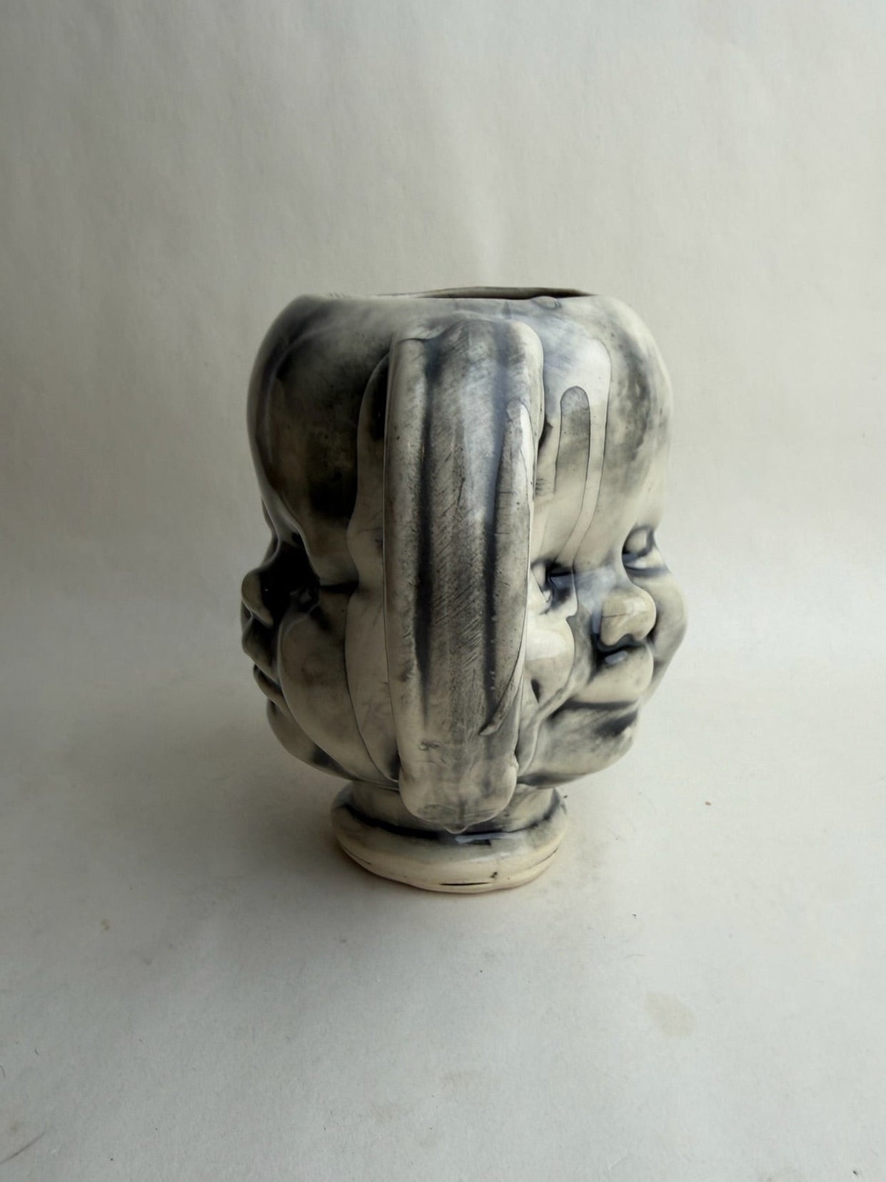 Three Face Baby Doll Head Mug