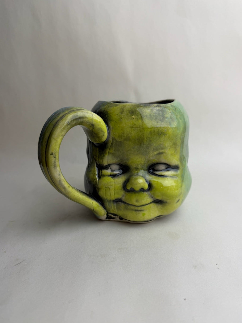 Three Face Baby Doll Head Mug