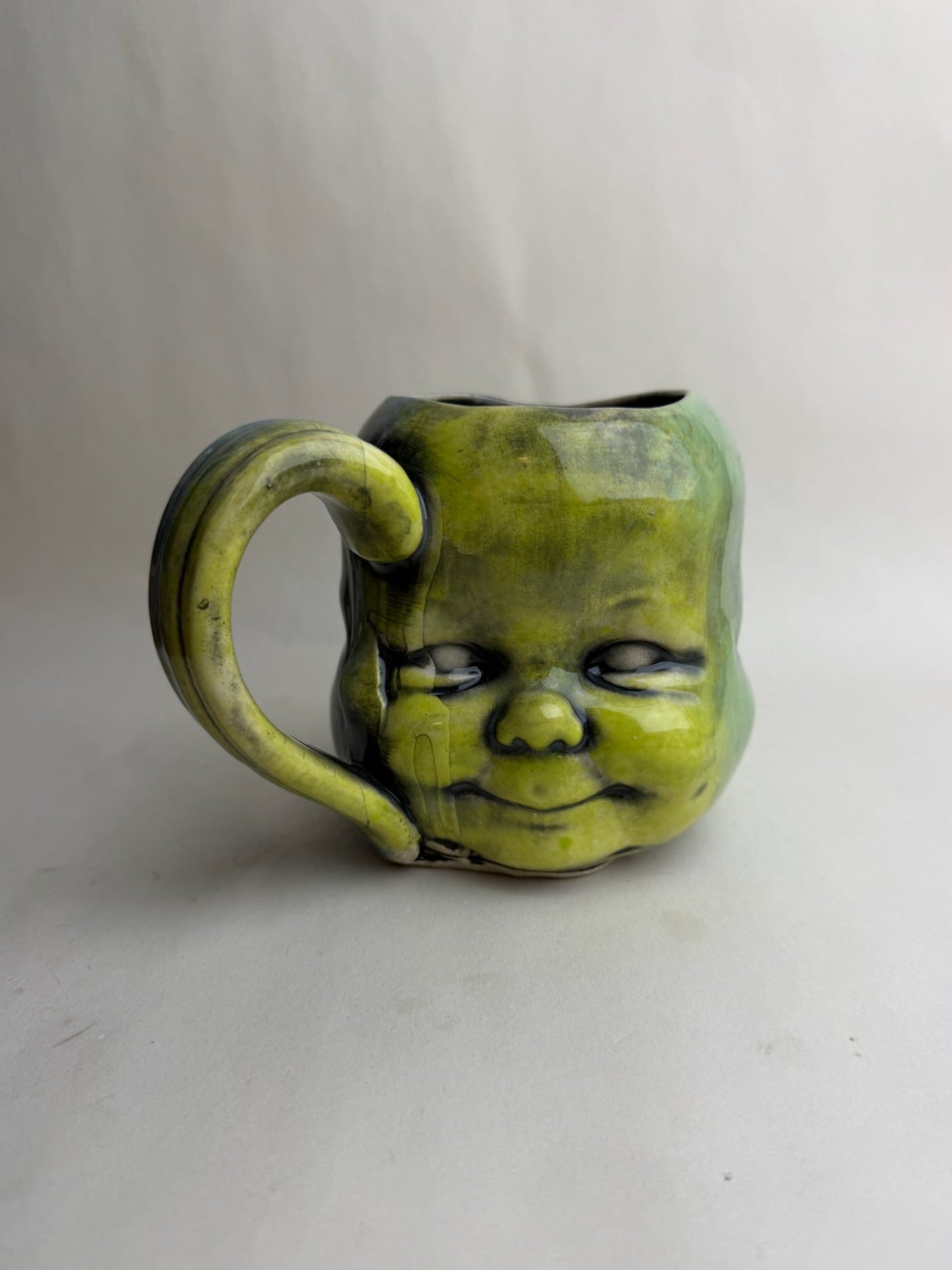 Three Face Baby Doll Head Mug