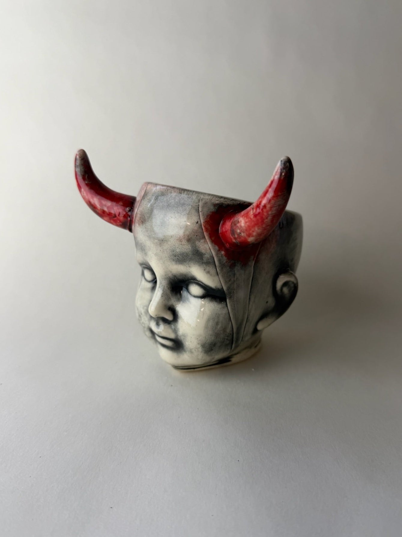 Horned Baby Doll Head
