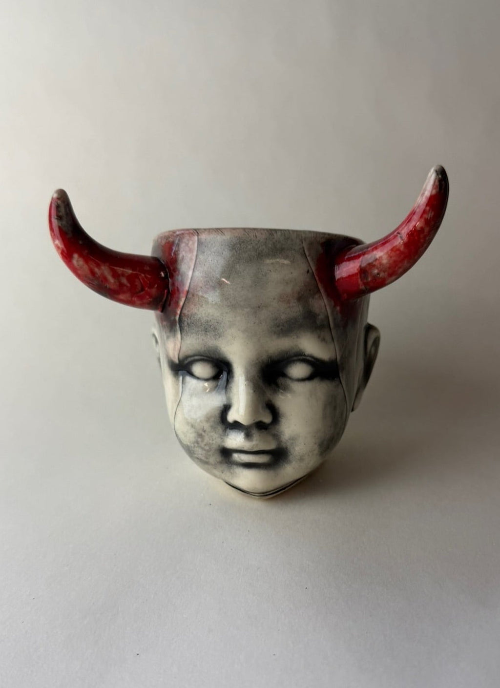 Horned Baby Doll Head
