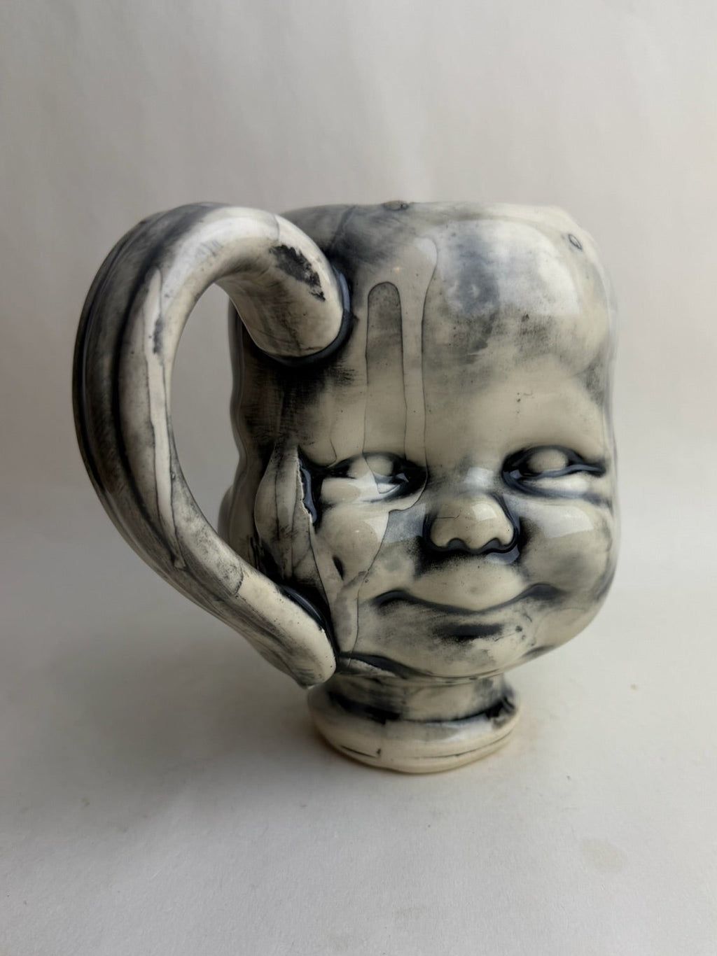 Three Face Baby Doll Head Mug