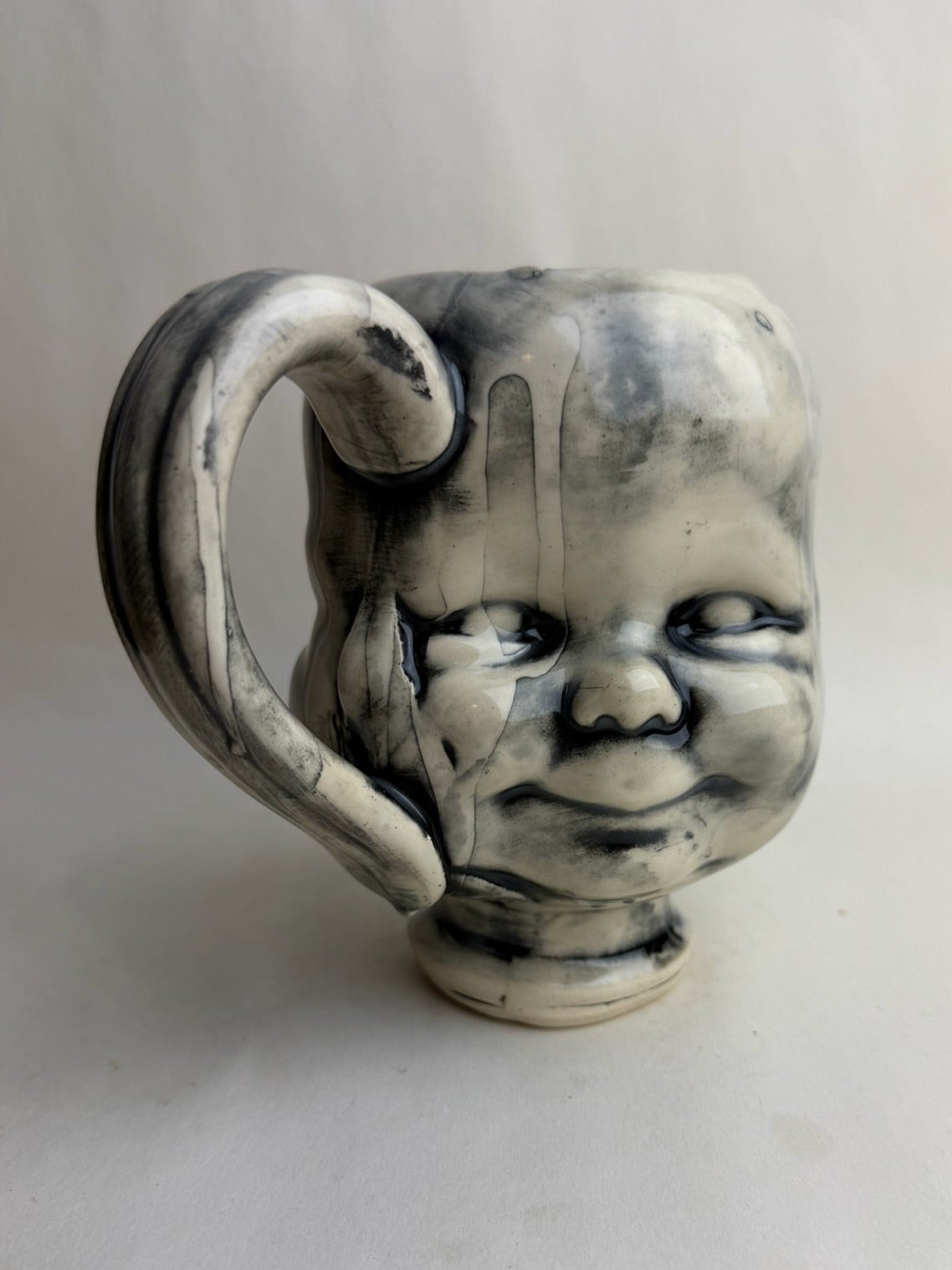 Three Face Baby Doll Head Mug