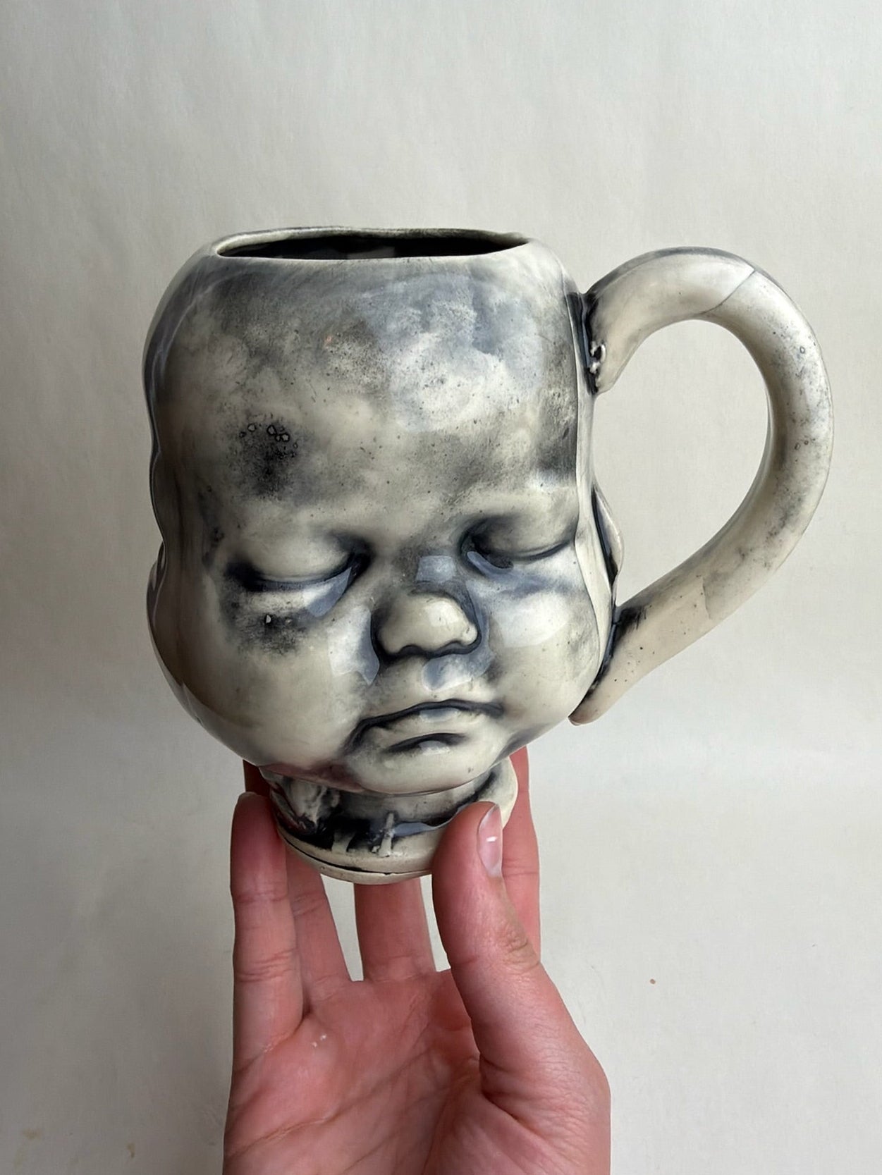Three Face Baby Doll Head Mug