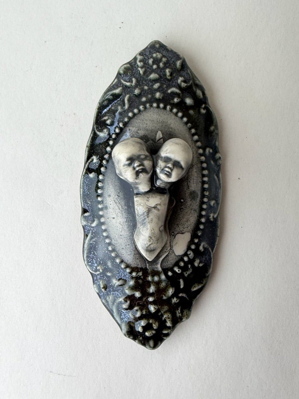 Two Headed Baby Doll Wall Decoration