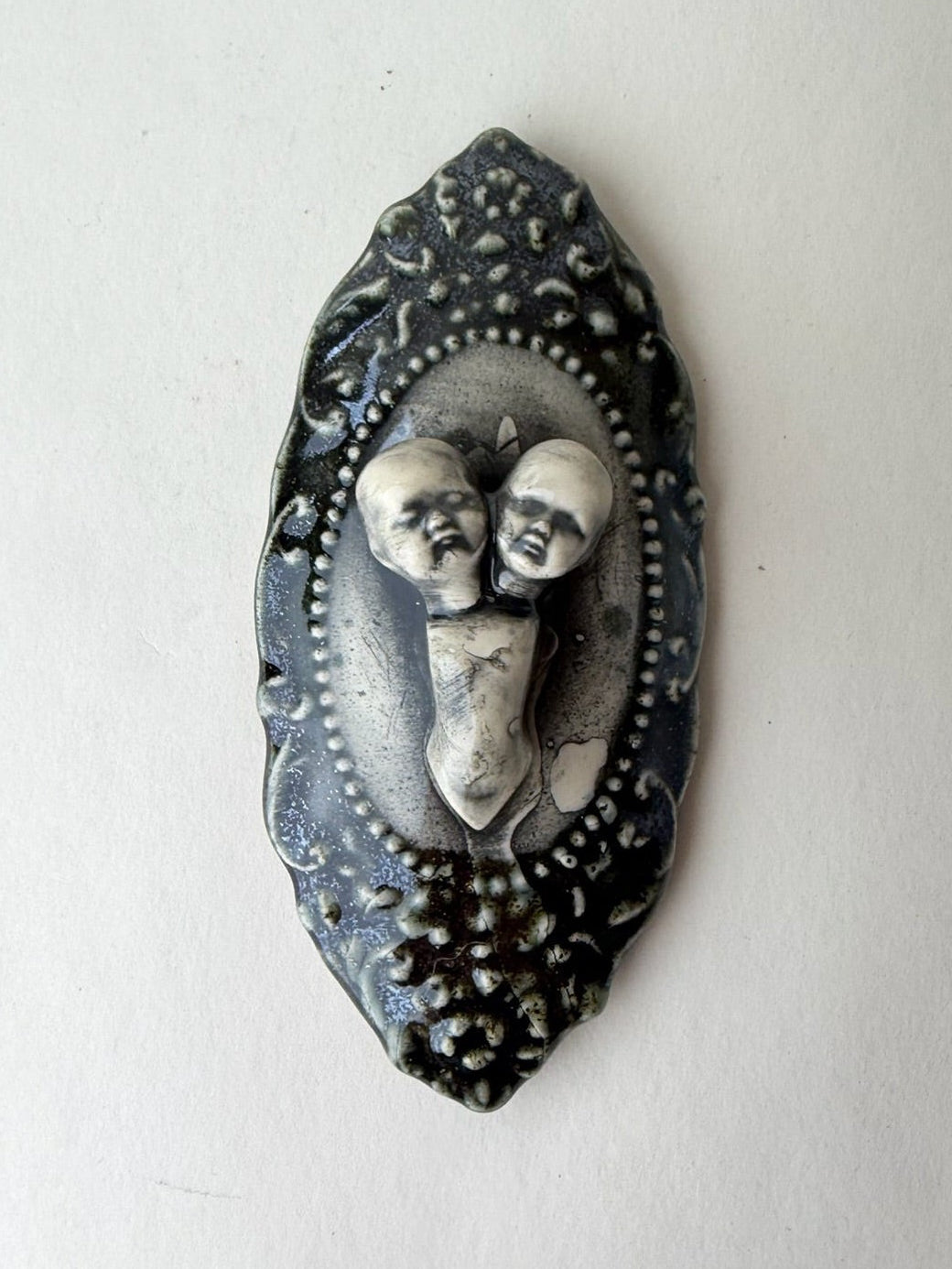 Two Headed Baby Doll Wall Decoration