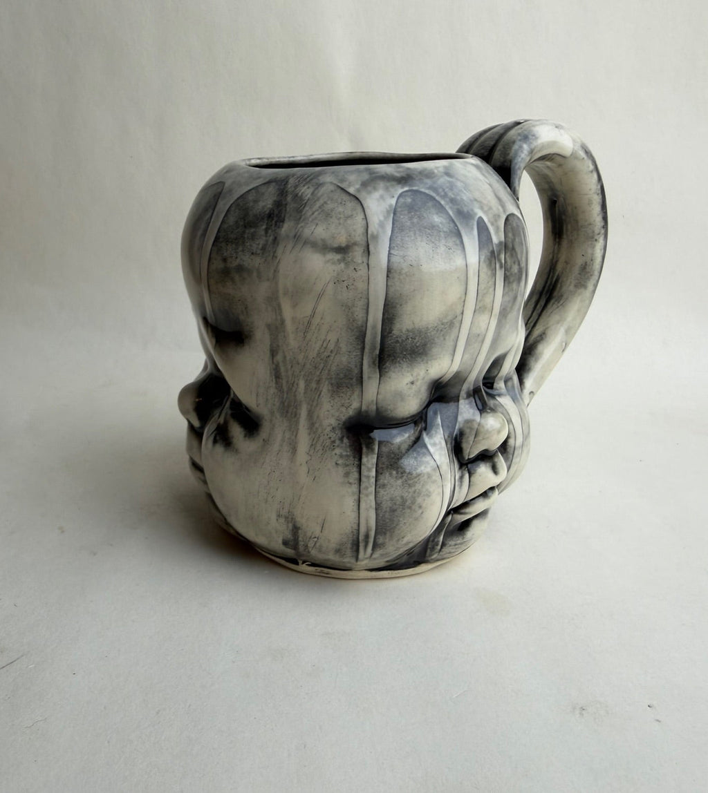 Three Face Baby Doll Head Mug