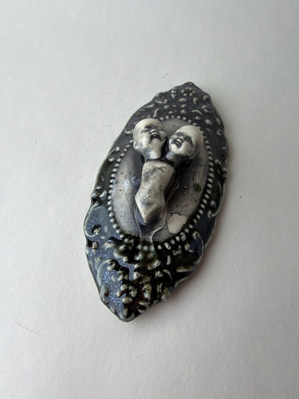 Two Headed Baby Doll Wall Decoration