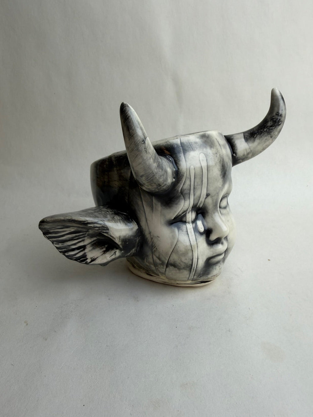 Horned Baby Doll Head With Ears