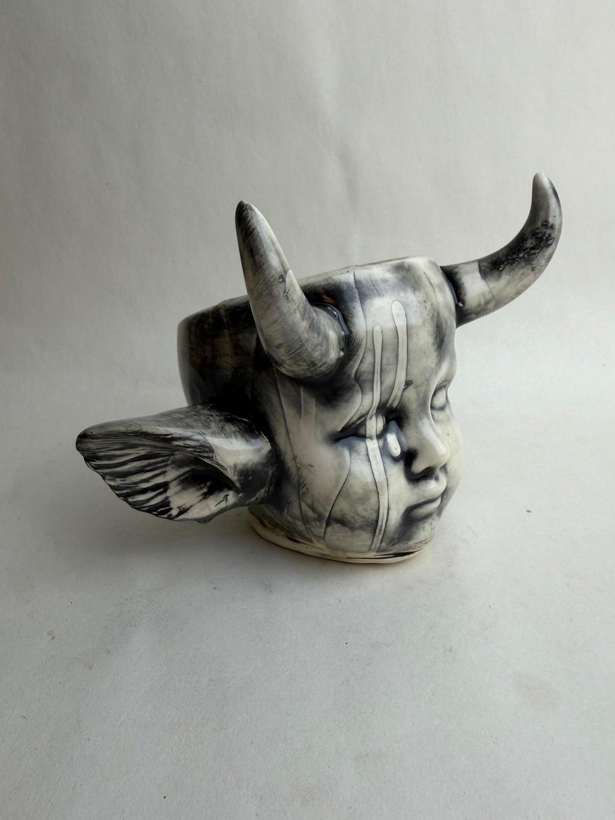 Horned Baby Doll Head With Ears
