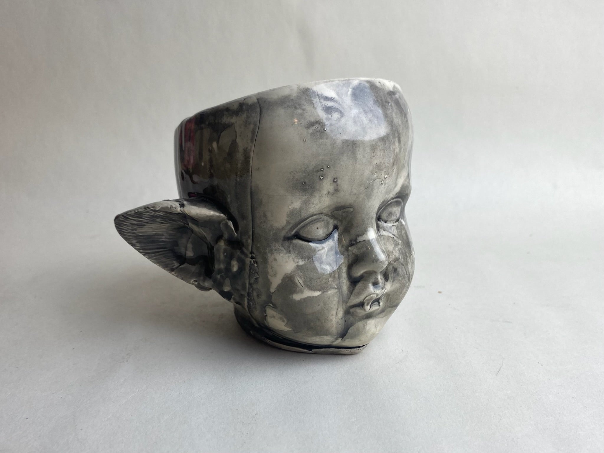 Monster Baby Doll Head With Pointed Ears and Fangs