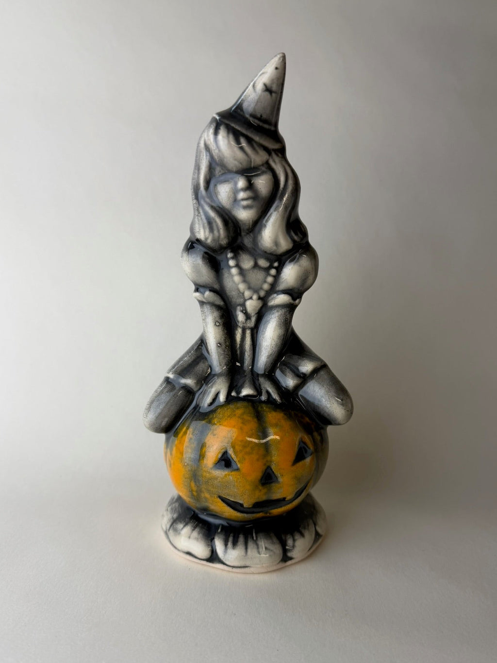 Witch on Jack-o-lantern