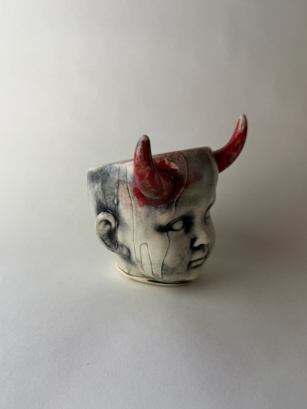 Horned Baby Doll Head