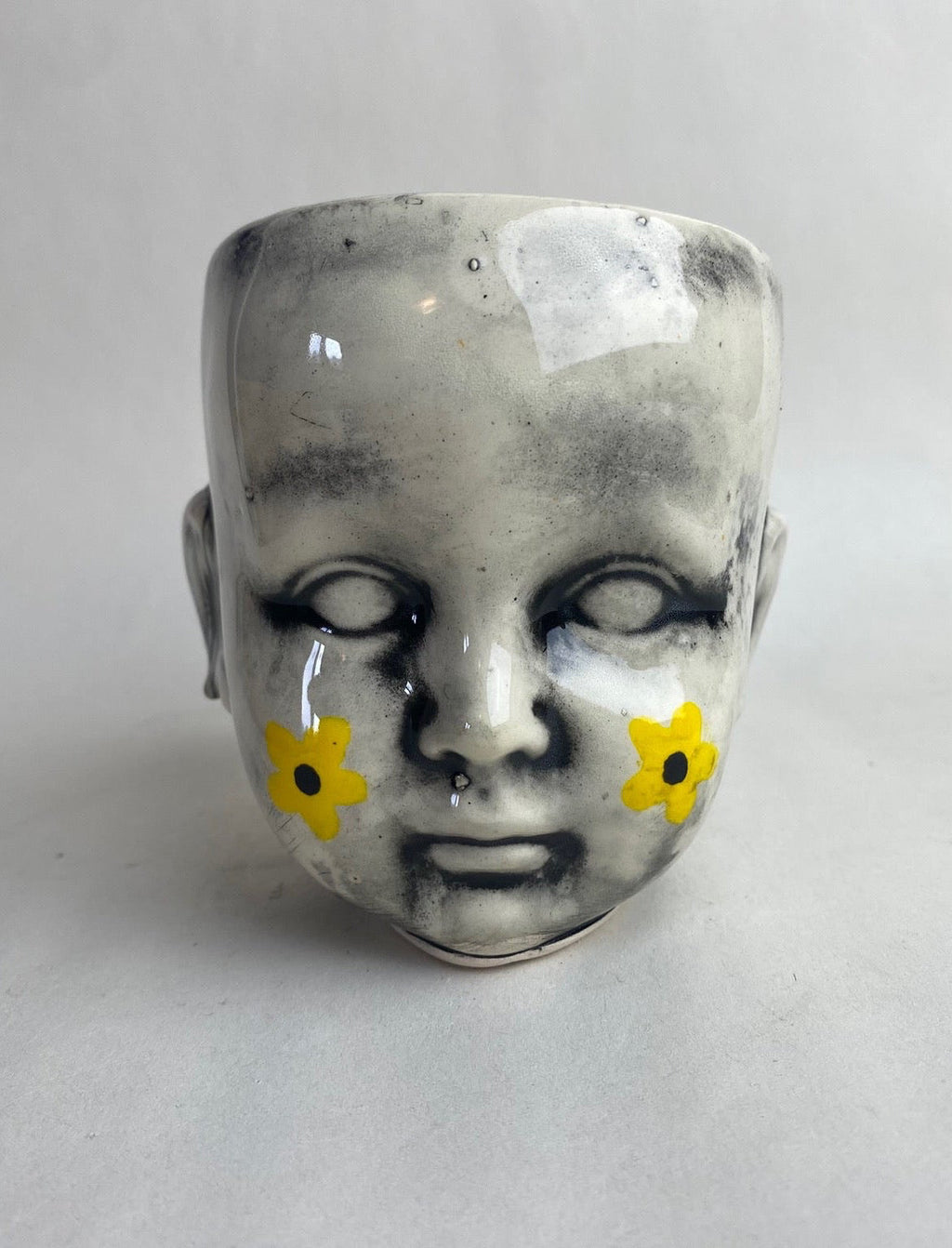 Doll Head Planter With Flower Design