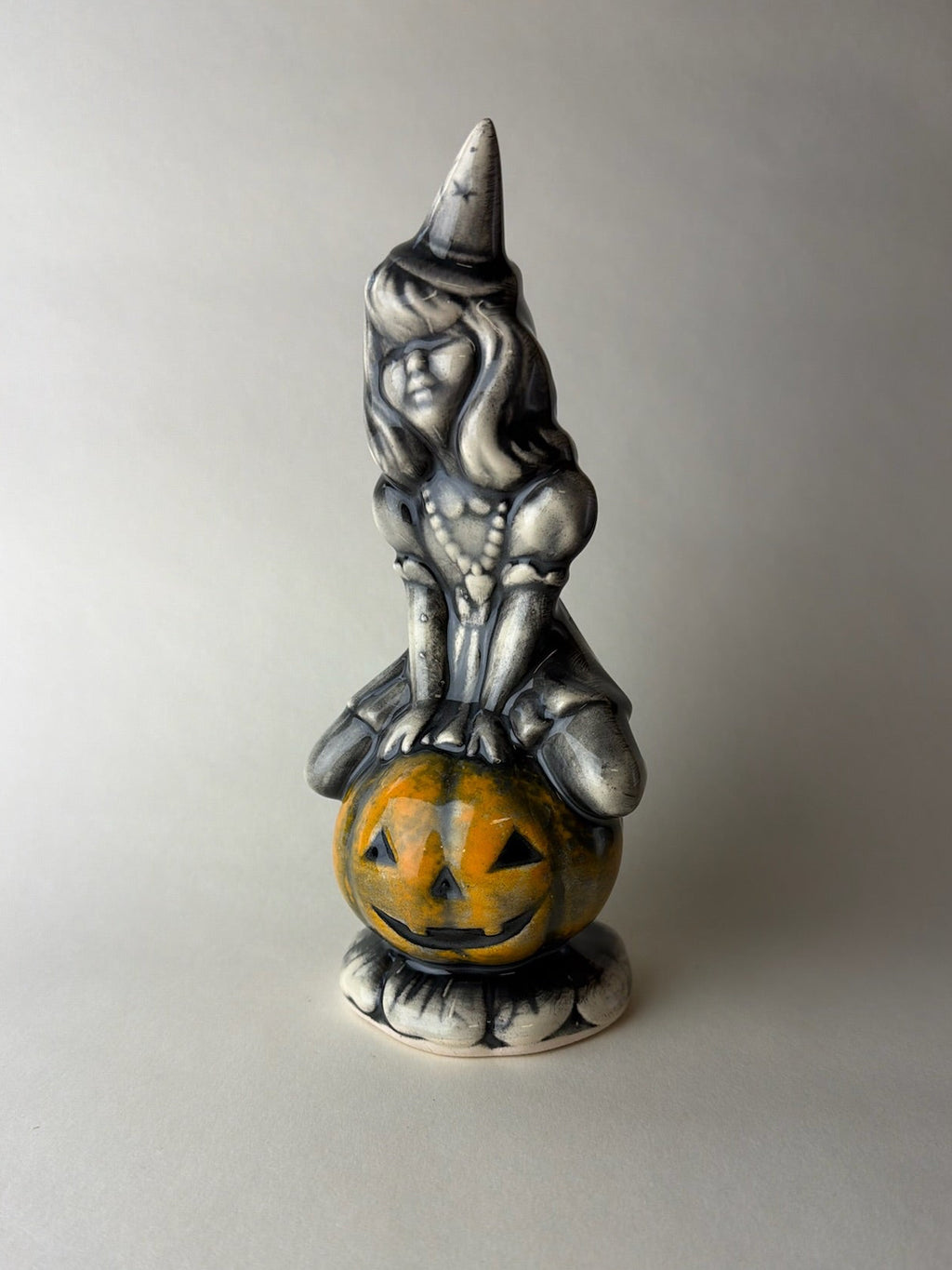 Witch on Jack-o-lantern