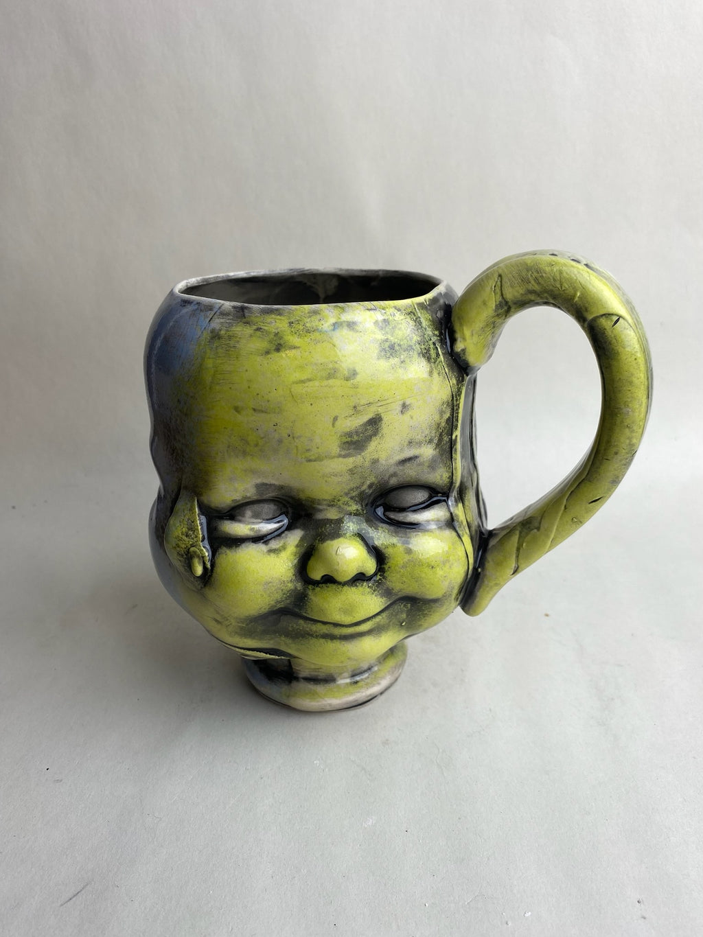 Three Face Baby Doll Head Mug