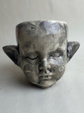 Monster Baby Doll Head With Pointed Ears and Fangs