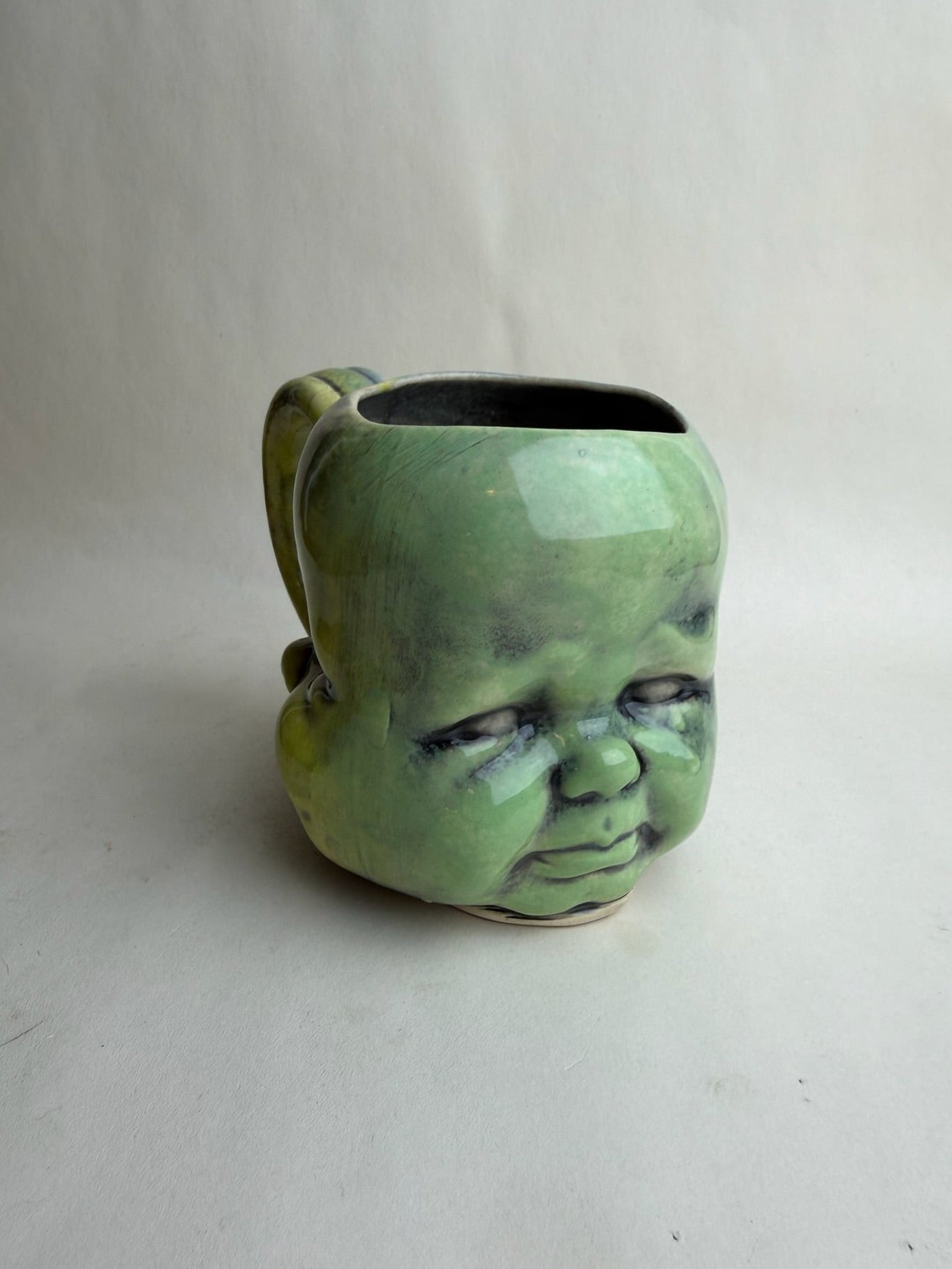 Three Face Baby Doll Head Mug
