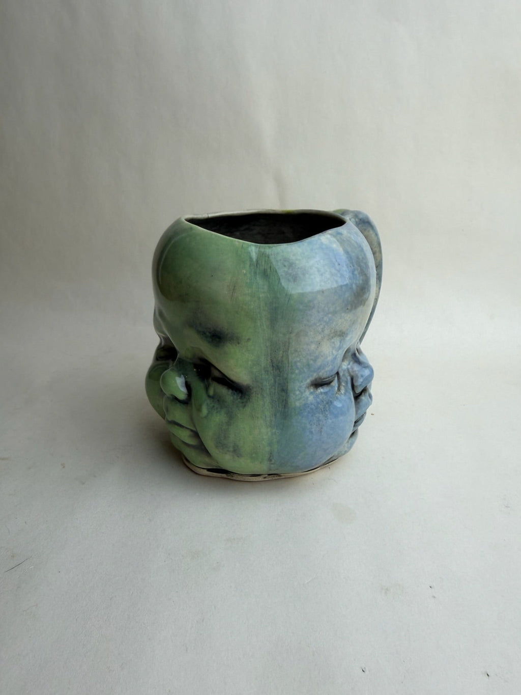 Three Face Baby Doll Head Mug