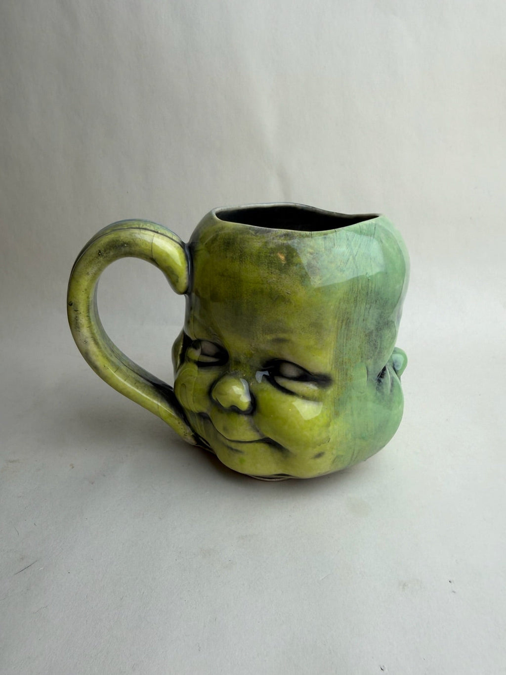 Three Face Baby Doll Head Mug