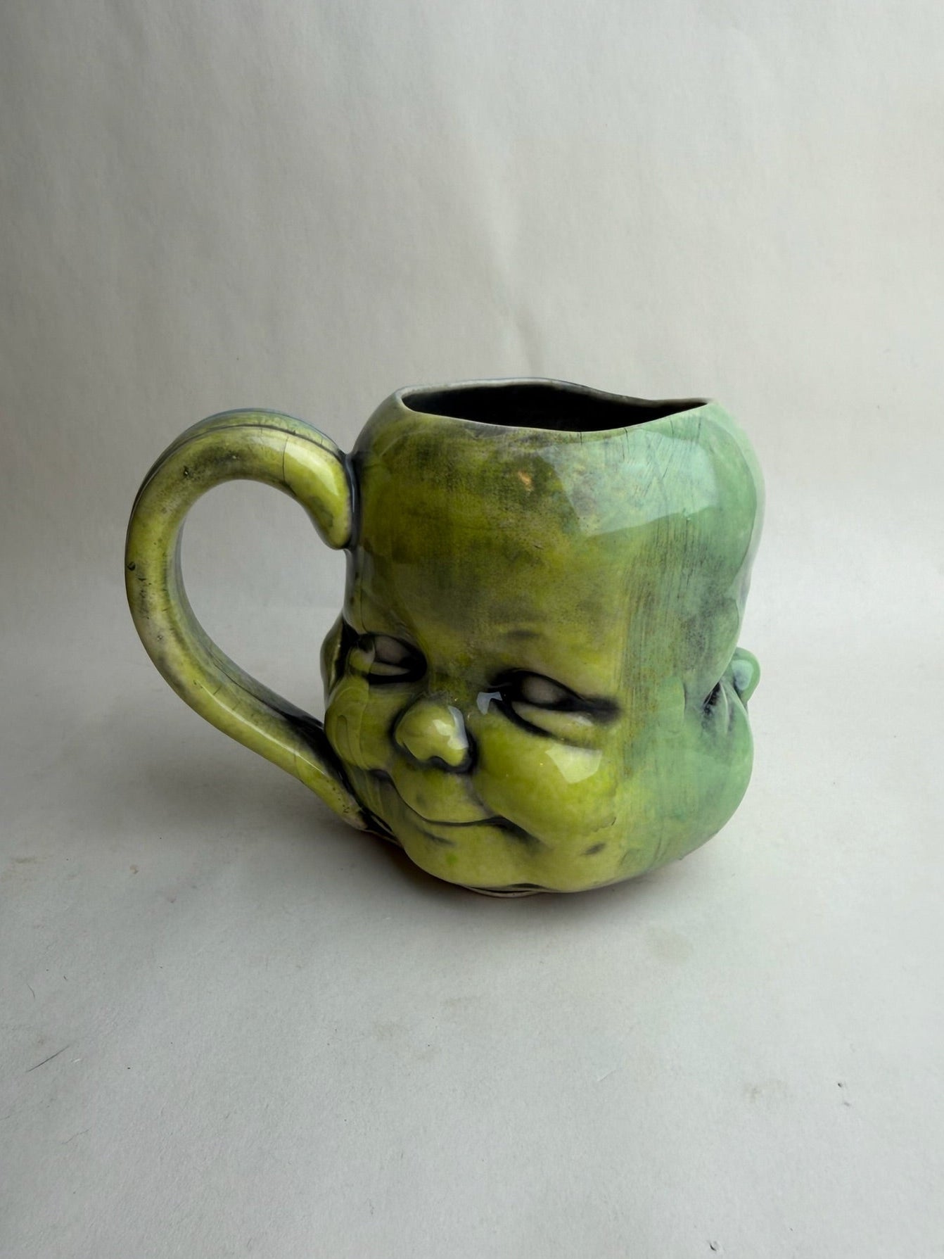 Three Face Baby Doll Head Mug