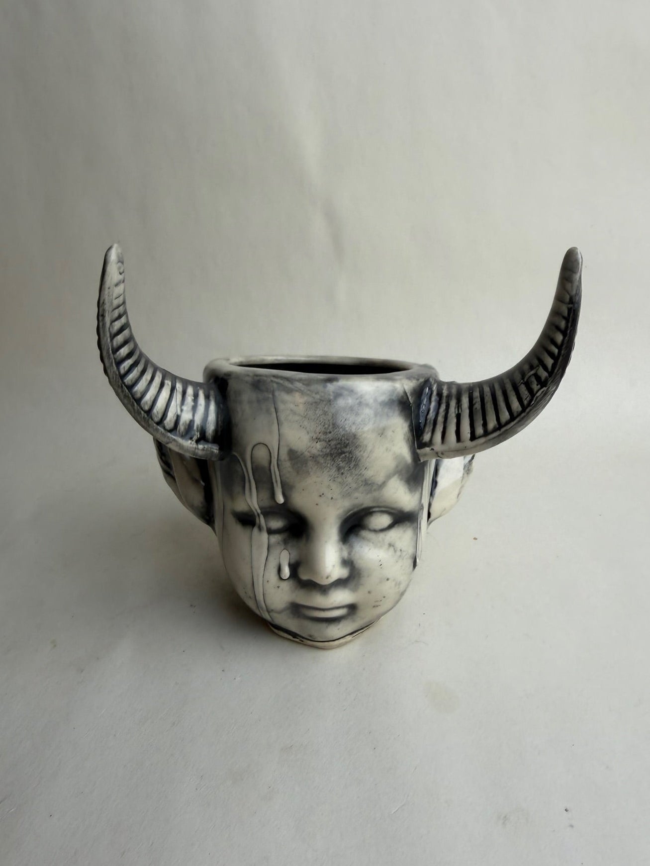 Horned Baby Doll Head With Pointed Ears