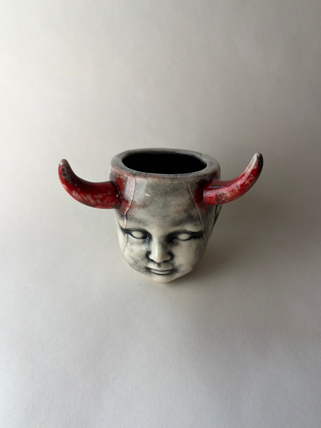 Horned Baby Doll Head