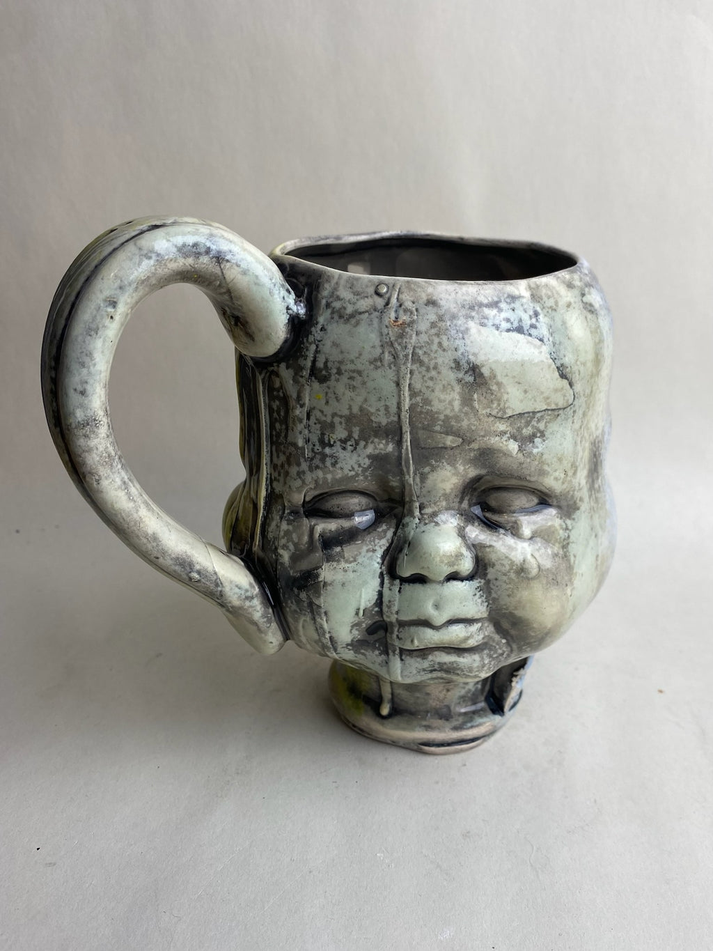 Three Face Baby Doll Head Mug