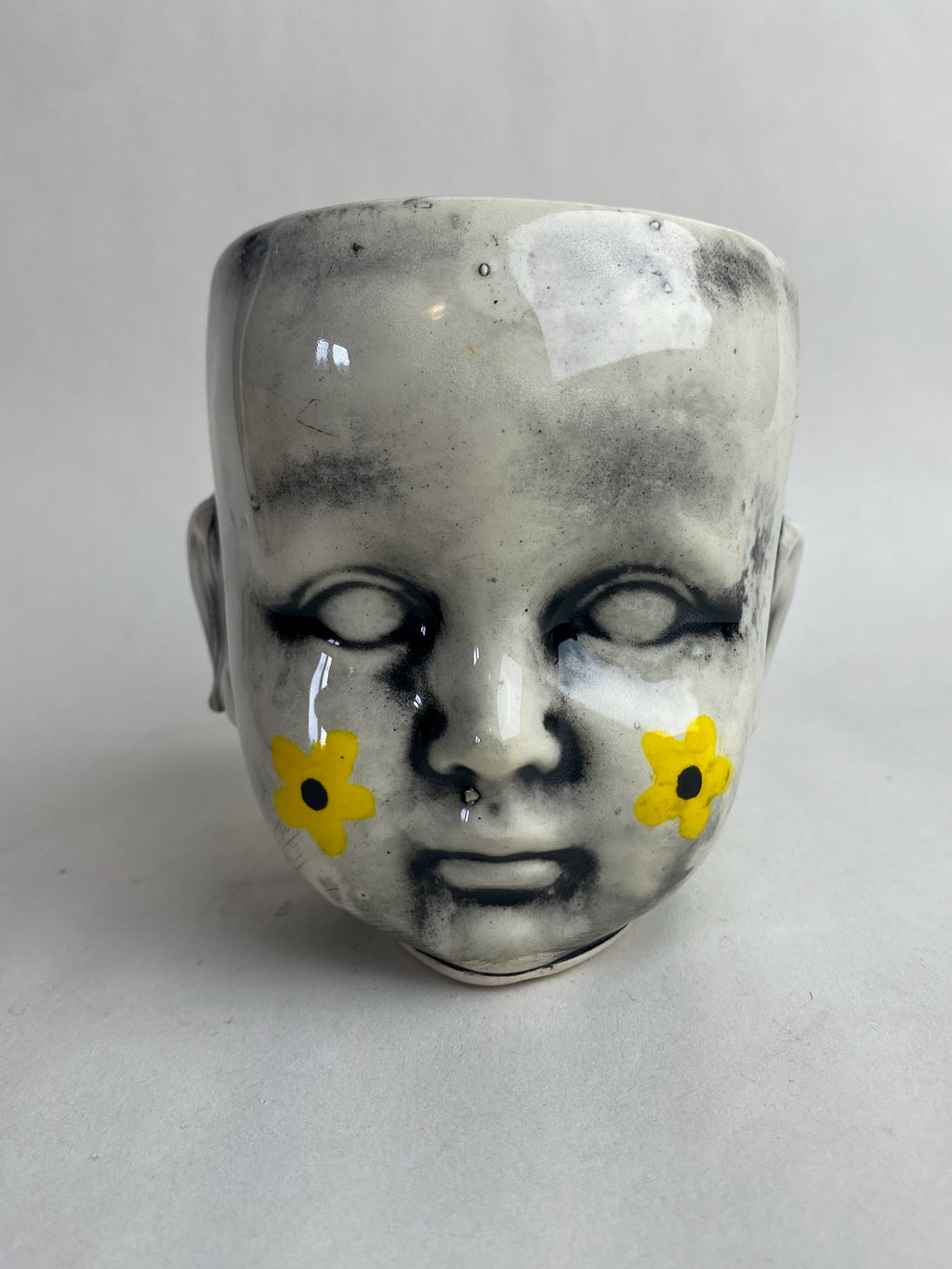 Doll Head Planter With Flower Design