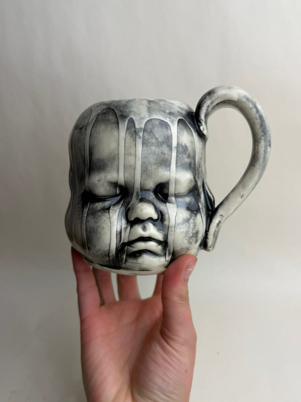 Three Face Baby Doll Head Mug