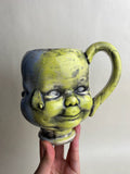 Three Face Baby Doll Head Mug