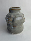 Three Face Baby Doll Head Vase