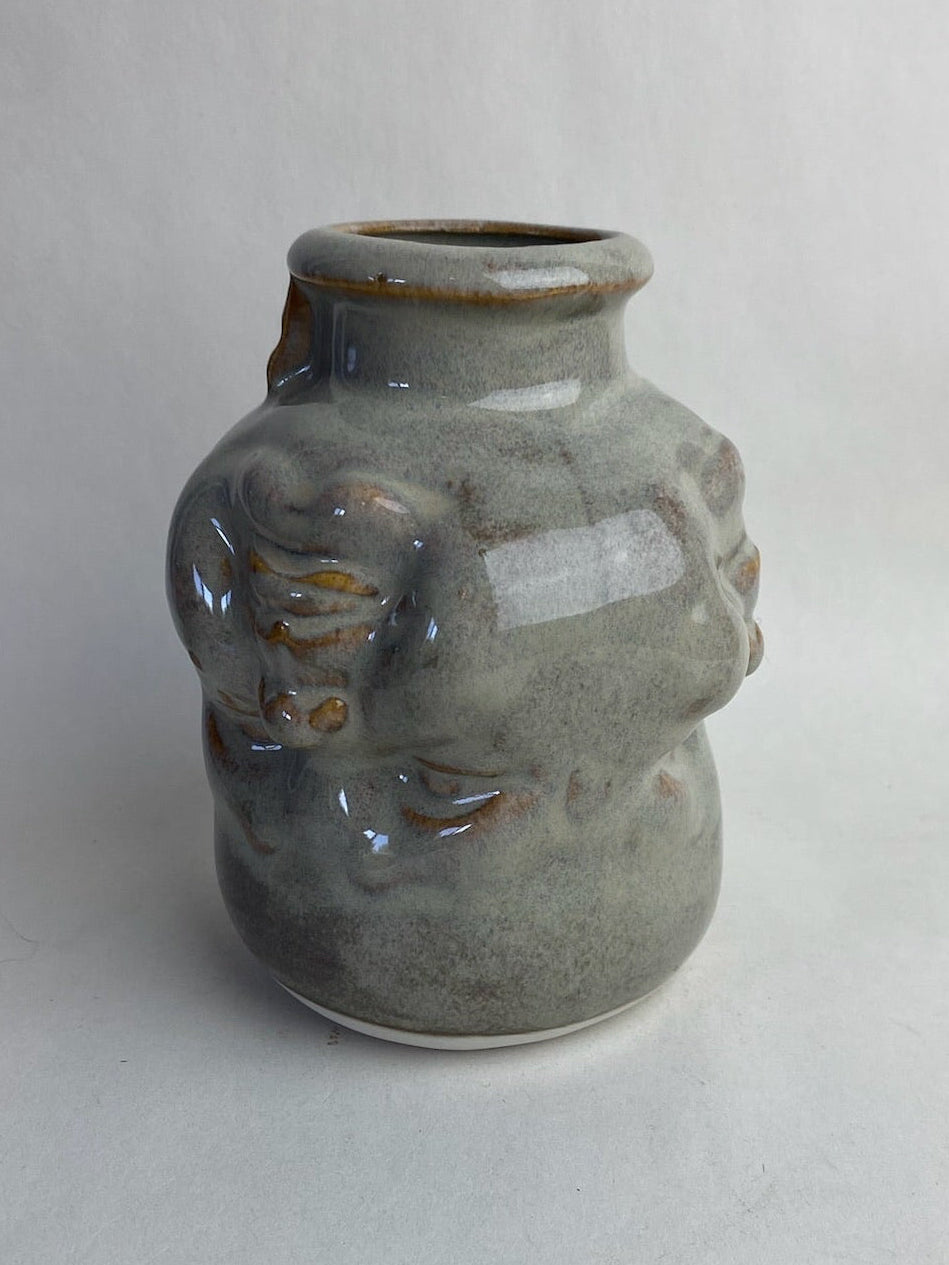Three Face Baby Doll Head Vase