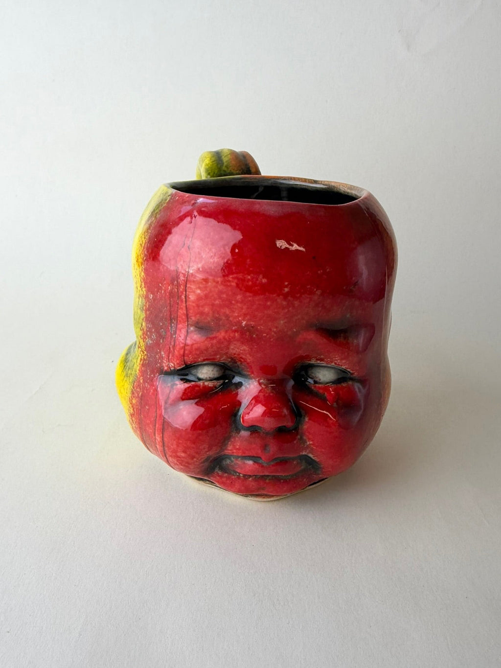 Three Face Baby Doll Head Mug, Warm Colors