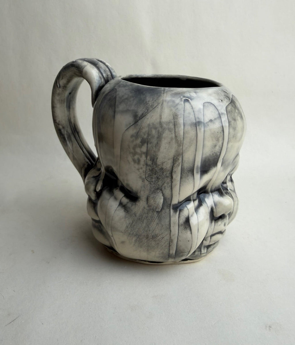Three Face Baby Doll Head Mug