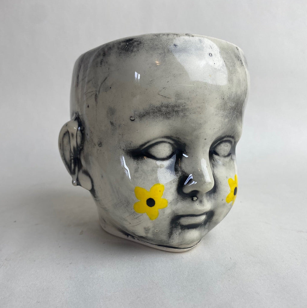 Doll Head Planter With Flower Design