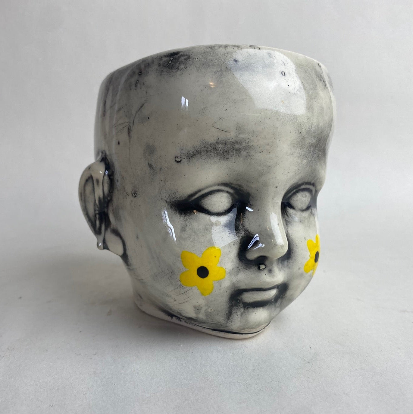 Doll Head Planter With Flower Design