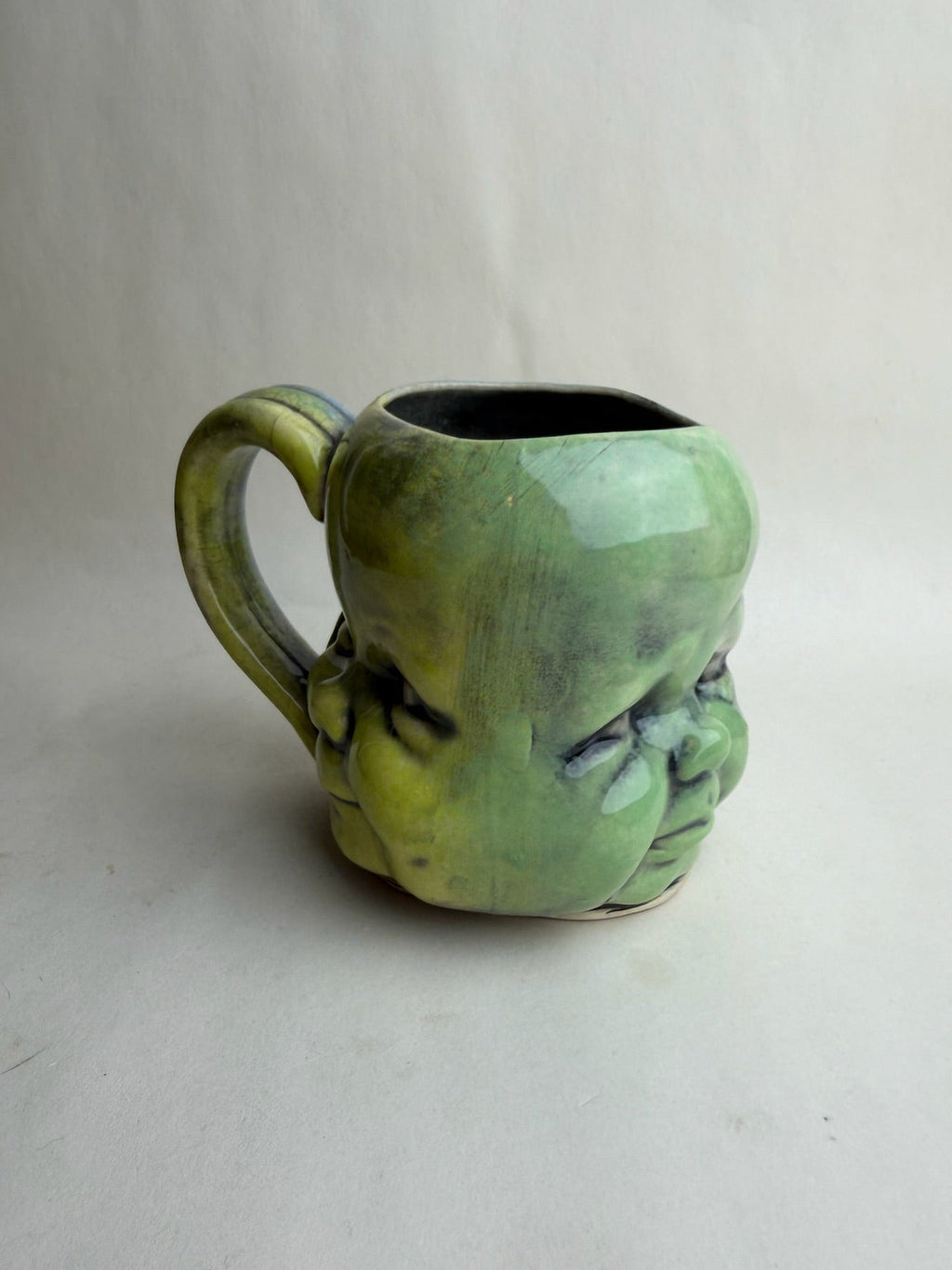 Three Face Baby Doll Head Mug