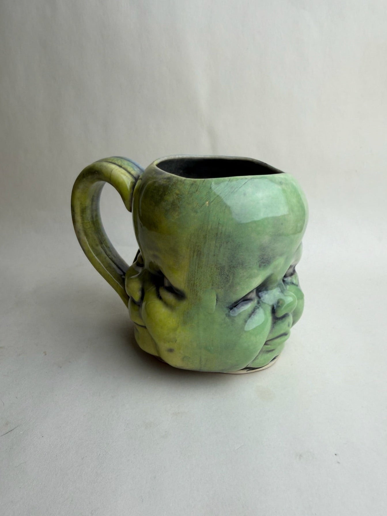 Three Face Baby Doll Head Mug